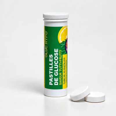 Tube de 10 pastilles de glucose tutti-frutti Gluc Hypo avec deux pastilles blanches devant